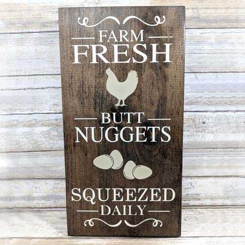 https://allgiftsconsidered.com/wp-content/uploads/2018/12/farm-fresh-butt-nuggets-sign.jpg