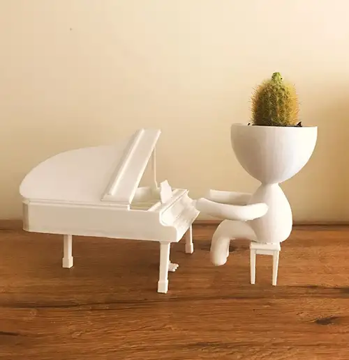 Piano Player Head Planter