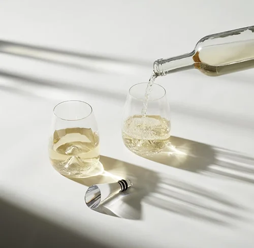 Crystal (we love this crystal wine stopper and glass set)